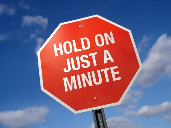 Stoppskylt håll på en minut — Stockfoto