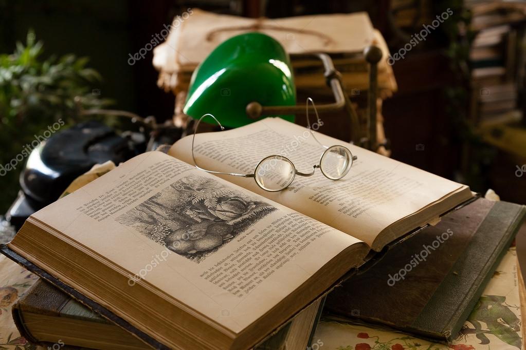 Old Round Glasses On Books Lawyer Lamp And Typewriter The Good