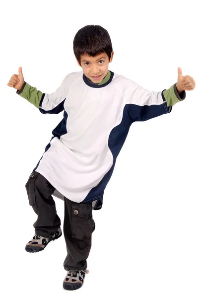 Мальчик одевает футбольную рубашку — стоковое фото