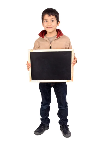 Маленький мальчик держит доску — стоковое фото