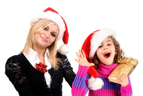 Mutter und Tochter in Weihnachtsmützen — Stockfoto