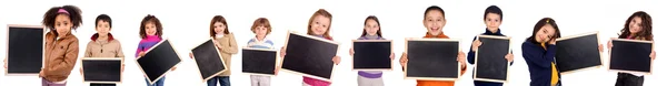 Little kids holding a black board — Stock Photo, Image