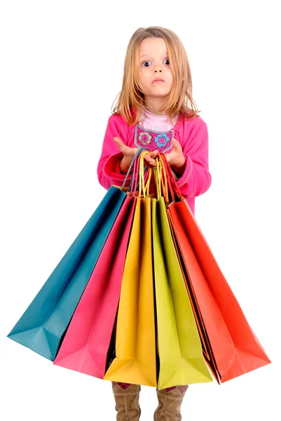 Niña con bolsas de compras —  Fotos de Stock