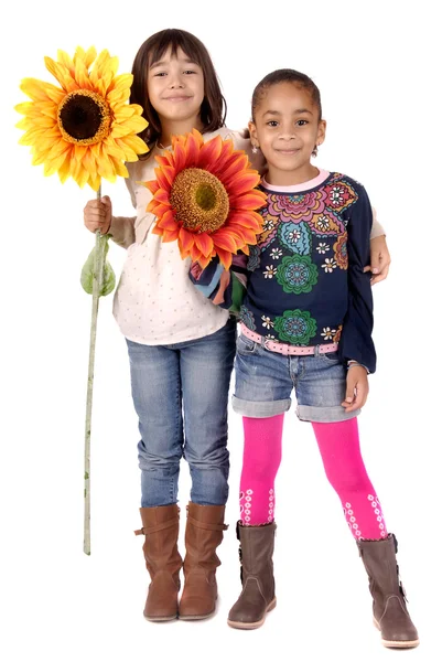 Girls holding flowers — Stock Photo, Image