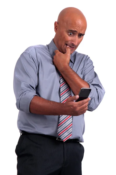 Obchodní muž s mobil — Stock fotografie