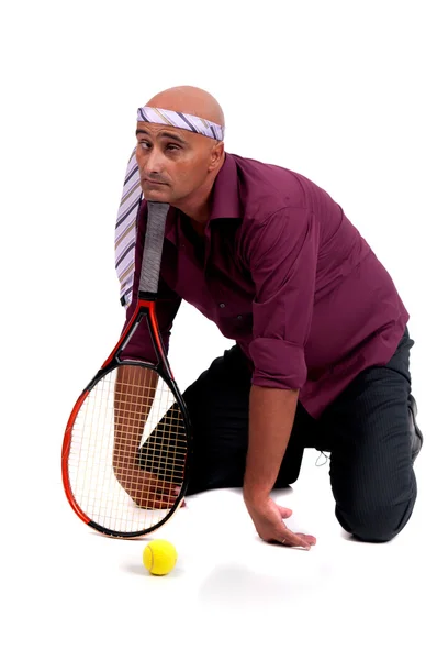 Geschäftsmann spielt Tennis — Stockfoto