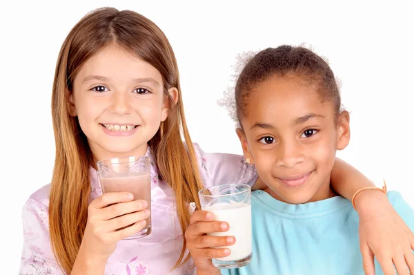 Littles girls with milk — Stock Photo, Image