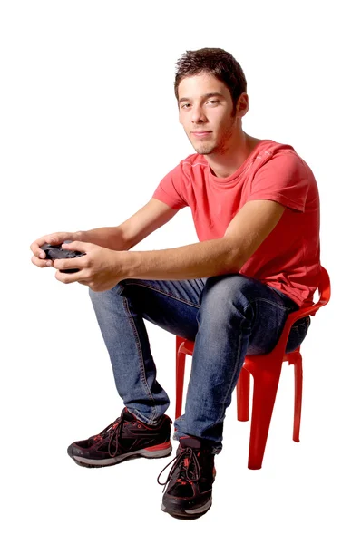 Teenage boy playing video games — Stock Photo, Image