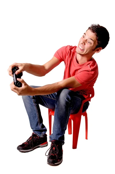 Teenage boy playing video games — Stock Photo, Image