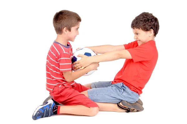 Boys fighting over soccer ball — Stock Photo, Image