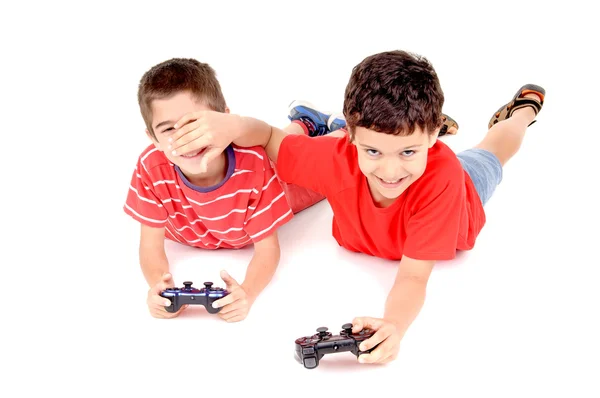 Jungen spielen Videospiele — Stockfoto