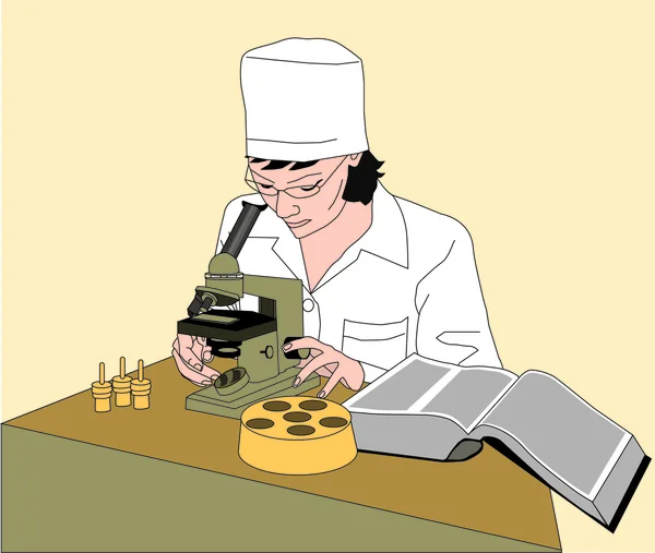 Doktor whith mikroskobu