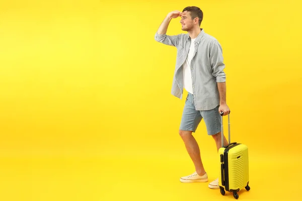 Traveling Concept Young Man Yellow Background Space Text — Stock Photo, Image