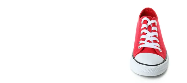 Una Zapatilla Roja Aislada Sobre Fondo Blanco —  Fotos de Stock