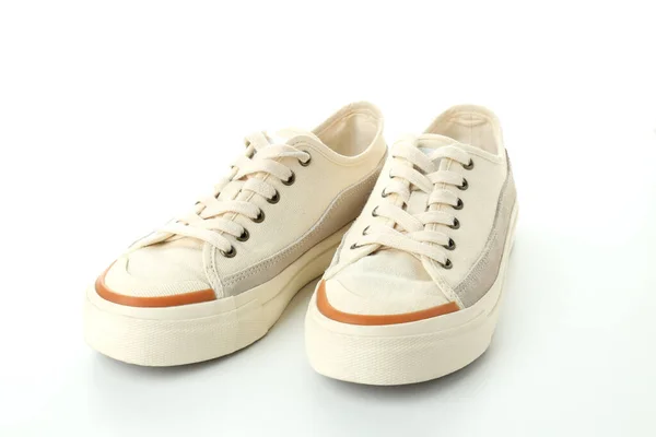 白色背景的米色运动鞋搭配 — 图库照片
