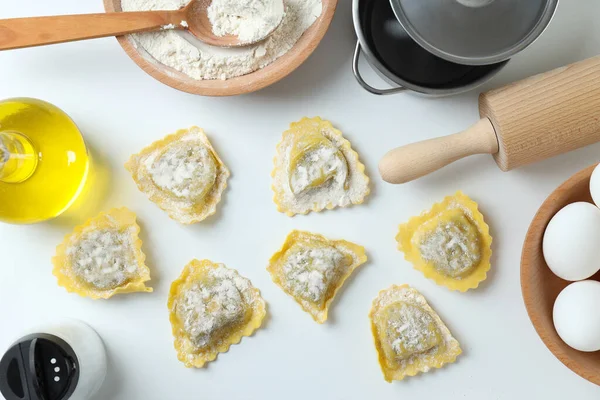 Konzept Des Kochens Von Ravioli Auf Weißem Hintergrund — Stockfoto