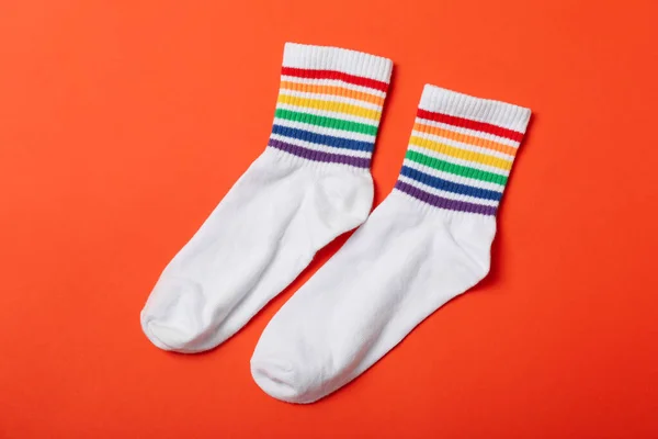 Paar Lgbt Sokken Oranje Achtergrond — Stockfoto