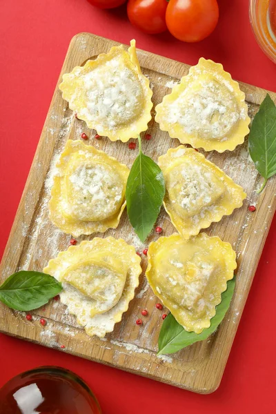 Concept Cooking Ravioli Red Background — Stock Photo, Image
