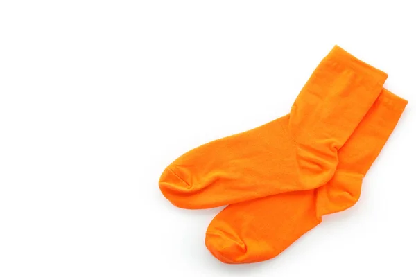白い背景に隔離された明るいオレンジ色の靴下 — ストック写真