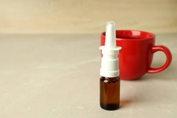 Blank Bottle Nasal Spray Cup Tea Light Table — Stock Photo, Image