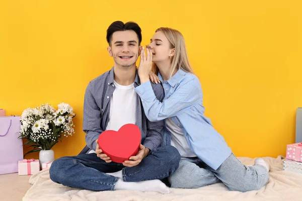 Cute Happy Couple Sitting Yellow Background — Stock Photo, Image