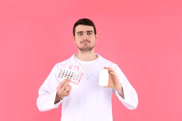 Doctor Holds Menstrual Calendar Pads Bottle Pills Pink Background — Fotografia de Stock
