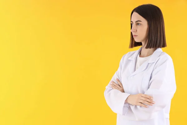 Female Doctor Yellow Background Space Text — Stock Fotó