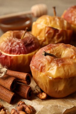 Concept of tasty food with baked apples, close up