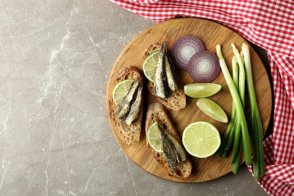 Board Sandwiches Sprats Gray Textured Background — Stock Photo, Image