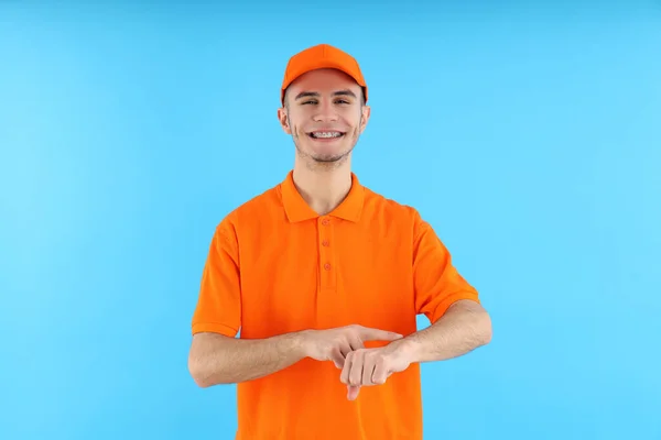 Attractive Young Delivery Man Blue Background — Stock Photo, Image