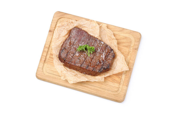 Cutting board with beef steak isolated on white background