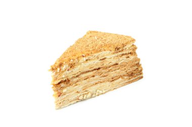 Beyaz arkaplanda izole edilmiş ballı kek parçası