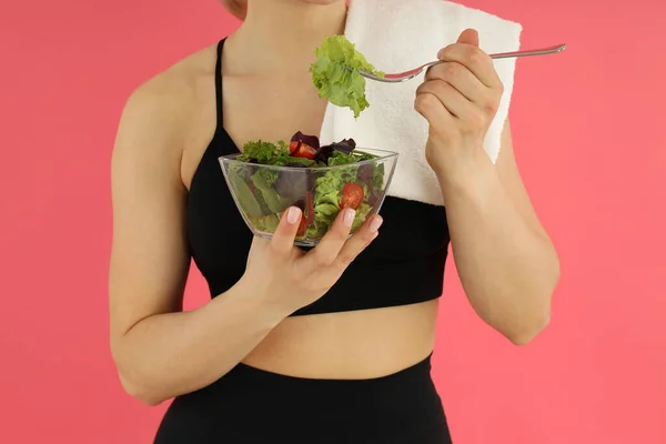 Concept Healthy Lifestyle Woman Eats Salad Pink Background — ストック写真