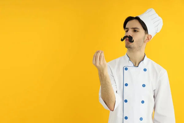 Concept Cooking Young Man Chef Yellow Background — Fotografia de Stock