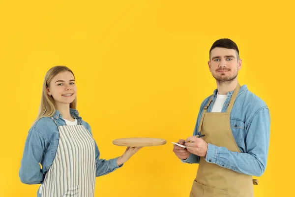 Concept Occupation Young Waiters Yellow Background — Stok fotoğraf