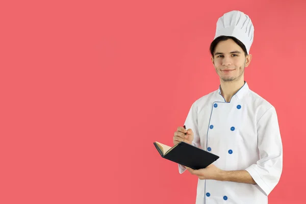 Concept Cooking Young Man Chef Pink Background — Fotografia de Stock