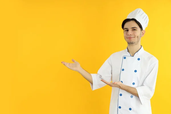 Concept Cooking Young Man Chef Yellow Background — ストック写真