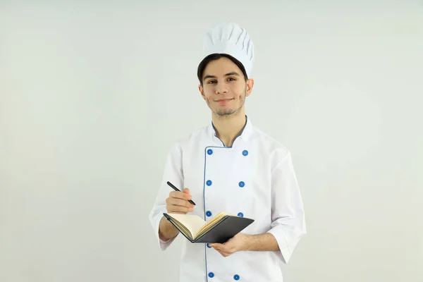 Koncept Vaření Mladý Muž Kuchař Světlém Pozadí — Stock fotografie