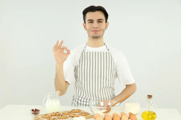 Concept Cooking Young Man Chef Light Background — Stock Fotó