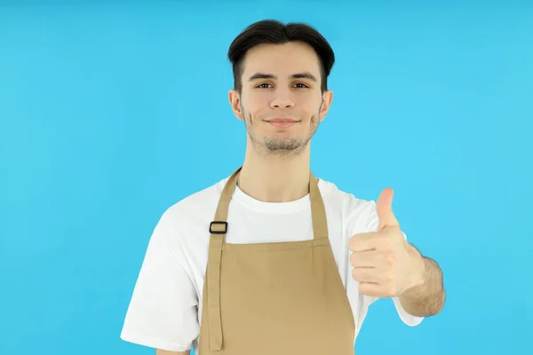 Concept Cooking Young Man Chef Blue Background — Zdjęcie stockowe