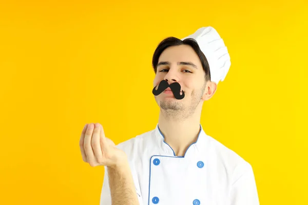 Concept Cooking Young Man Chef Yellow Background — Foto Stock