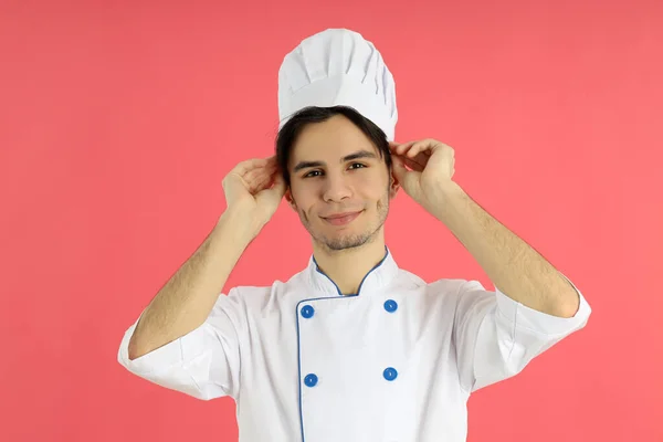Concept Van Koken Jonge Mannelijke Chef Kok Roze Achtergrond — Stockfoto