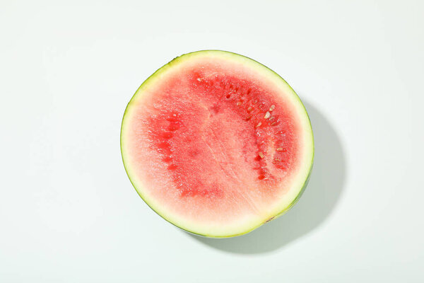 Half of fresh watermelon on white background