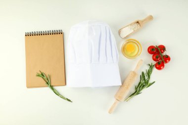 Concept of cooking food with chef hat, top view