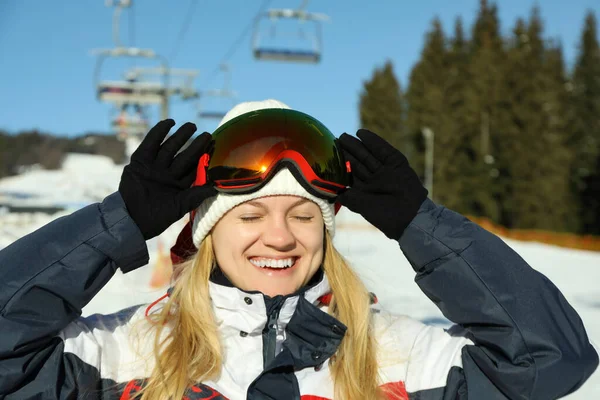 Happy Female Skier Goggles Mountain Resort —  Fotos de Stock