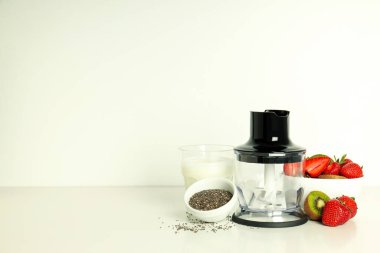 Concept of cooking food with blender, space for text