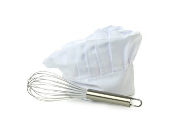 Chef hat and whisk isolated on white background