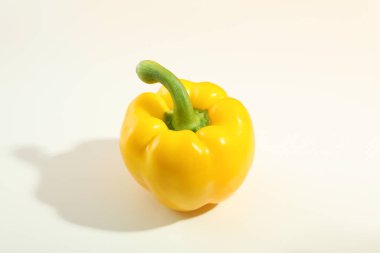 Yellow bell pepper on white background, close up