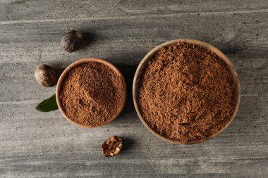 Concept of spices and condiments, nutmegs, top view