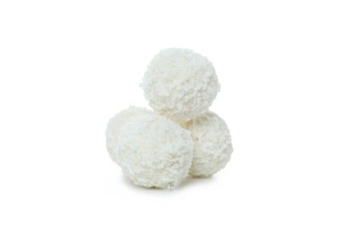Tasty coconut candies isolated on white background